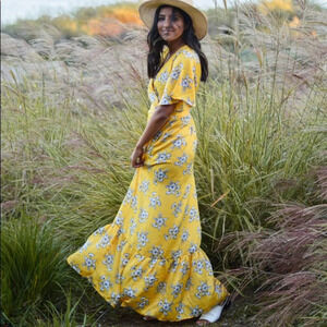 Love kuza satin like golden yellow floral wrap dress. Size M